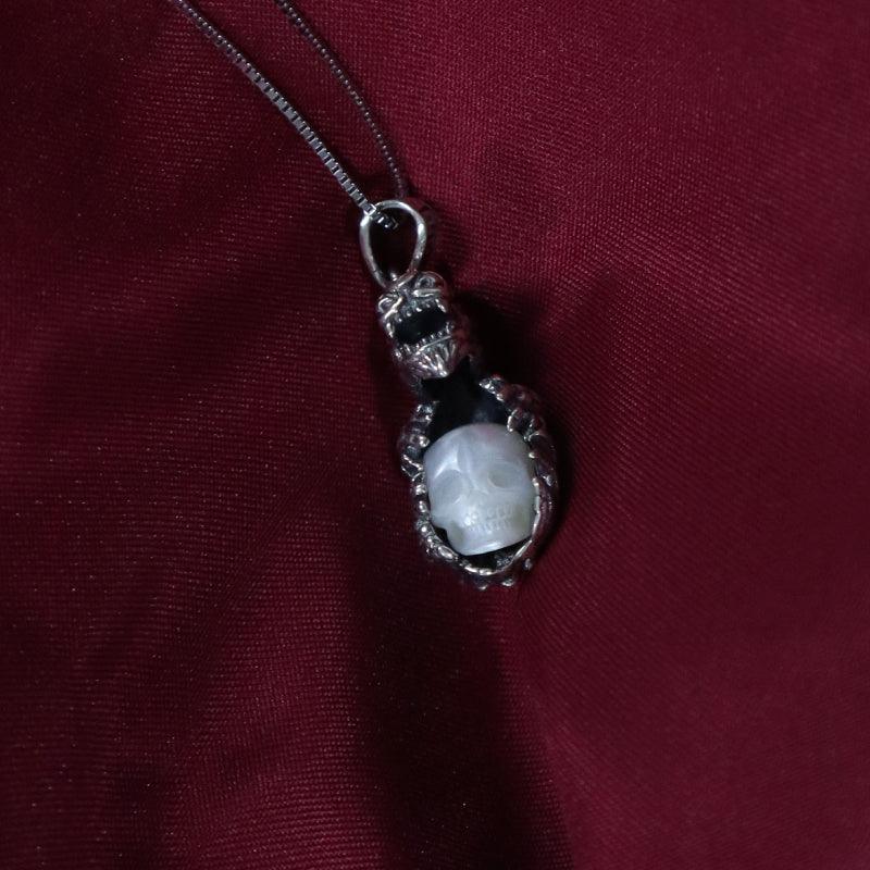 Belle Juri Dragon Holding Pearl Skull Necklace