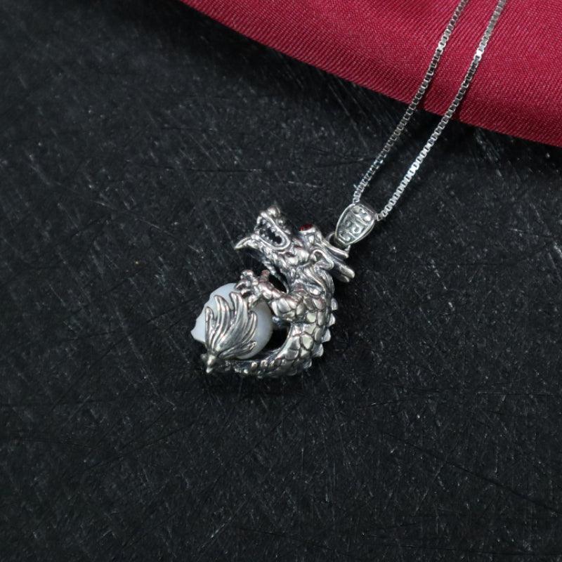 Belle Juri Dragon Holding Pearl Skull Necklace