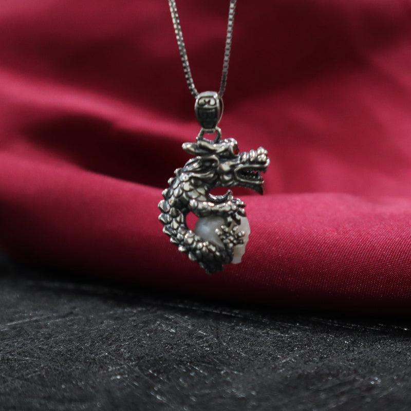 Belle Juri Dragon Holding Pearl Skull Necklace