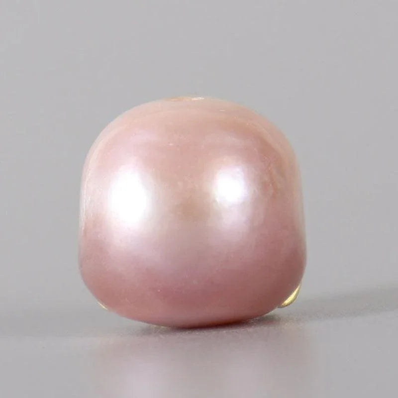 Belle Juri Light Orchid Pearl Carved Śmaśana Skull Bead With Golden & Black Eyes