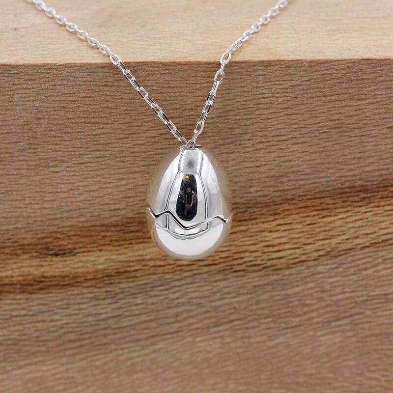 Belle Juri Openable Silver Eggshell Pearl Skull Necklace