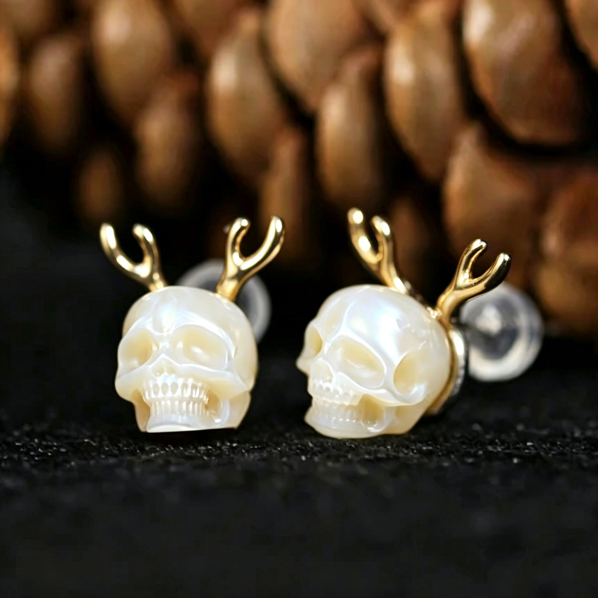 Pendientes de calavera de perlas astas