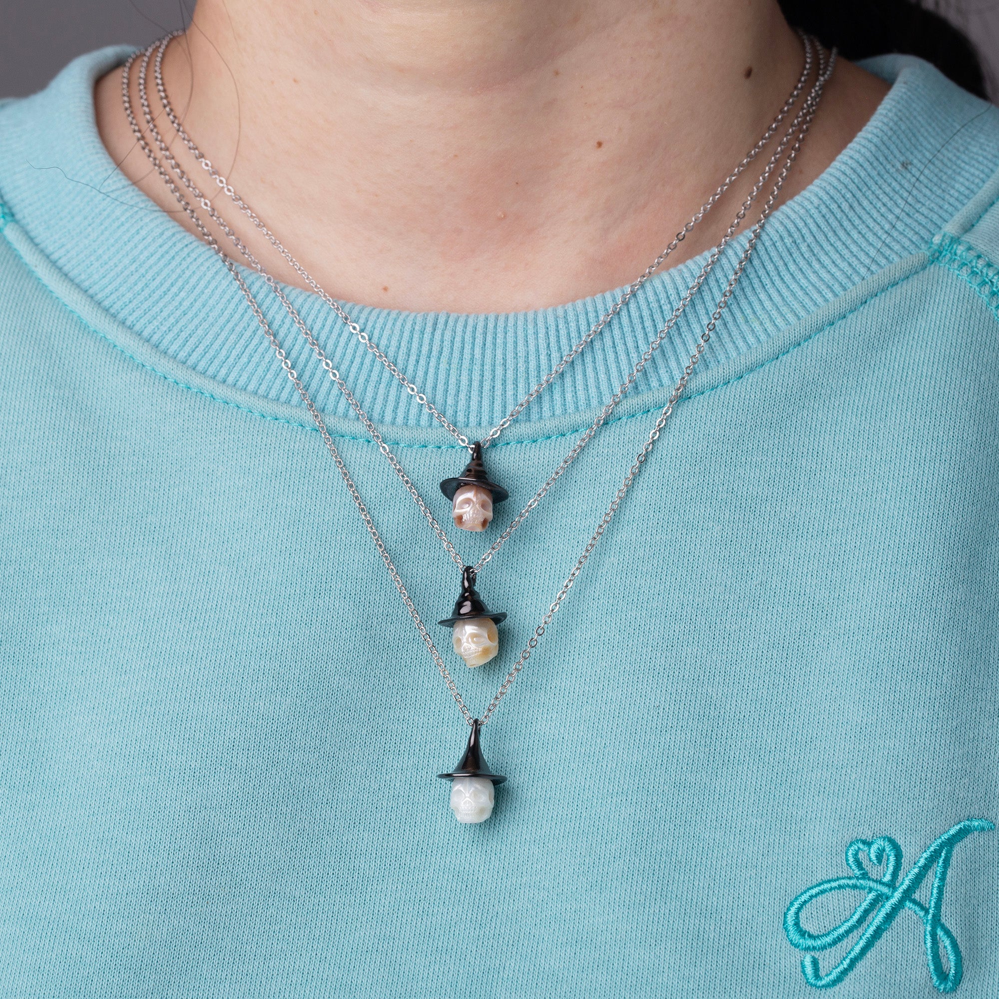 Black Witch Hat Carved Pearl Skull Necklace