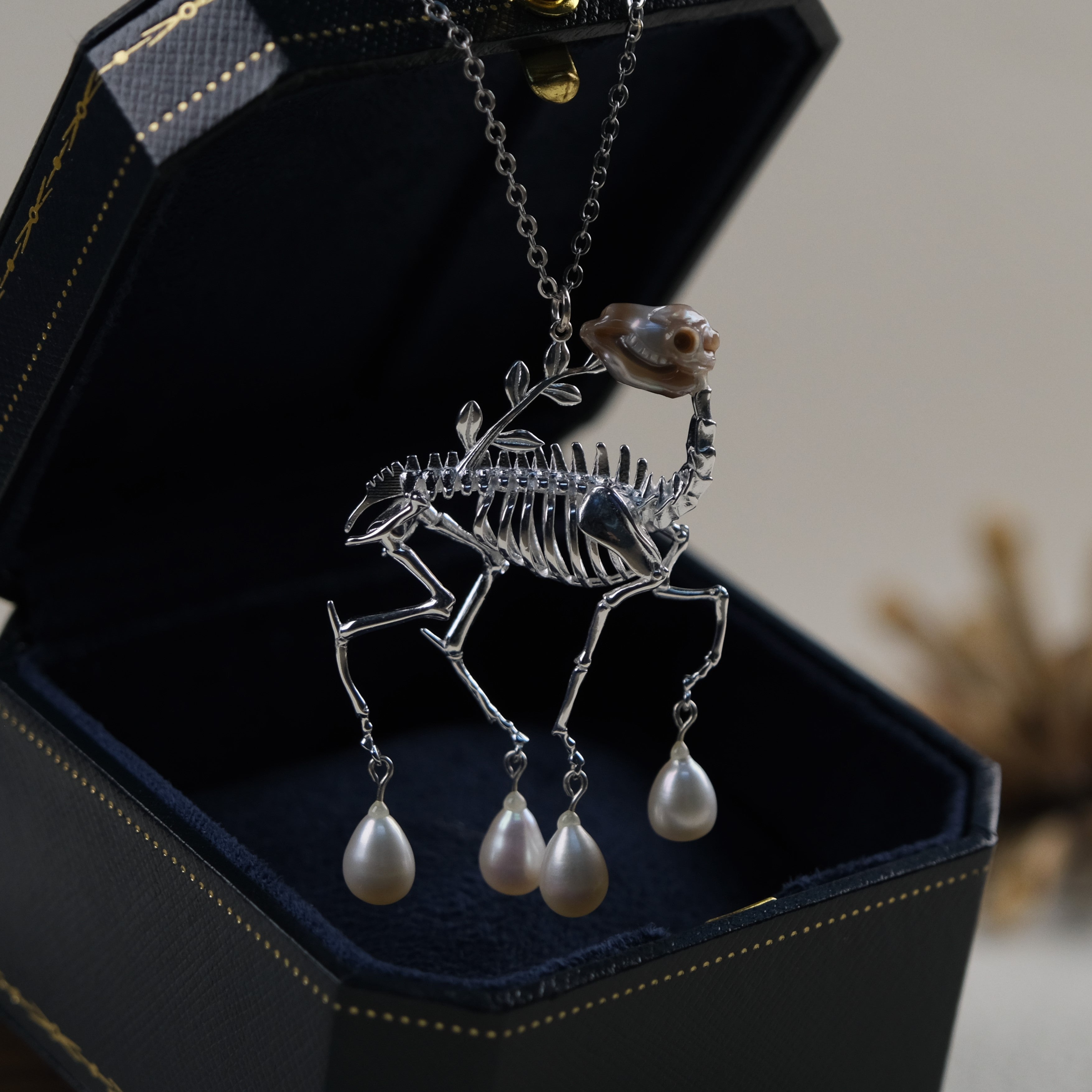 Carved Pearl Skull Reindeer Skeleton Earrings & Necklace