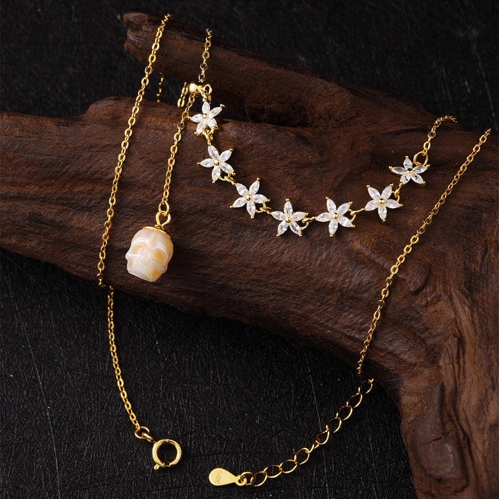 Crana cing oro del cranio perla delicata