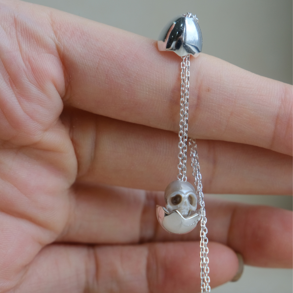 Eggshell Broken Pearl Skull Silver Pendant Necklace