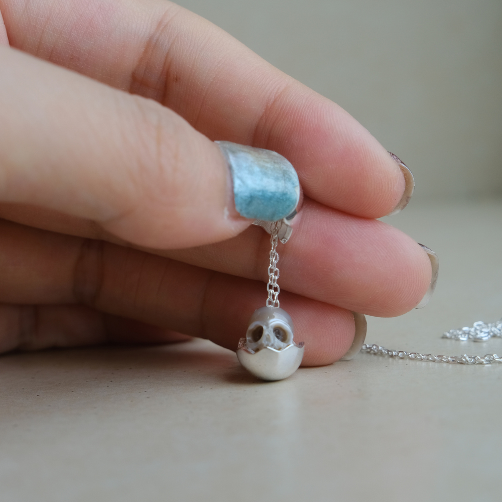 Eggshell Broken Pearl Skull Silver Pendant Necklace