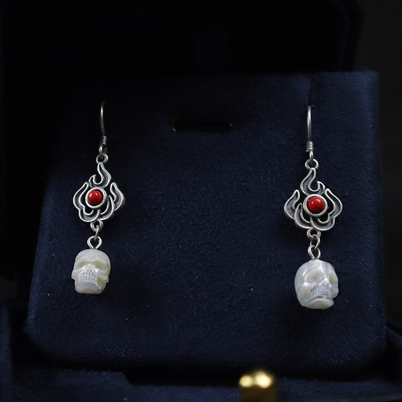 Pendientes de cráneo de perlas en forma de llama