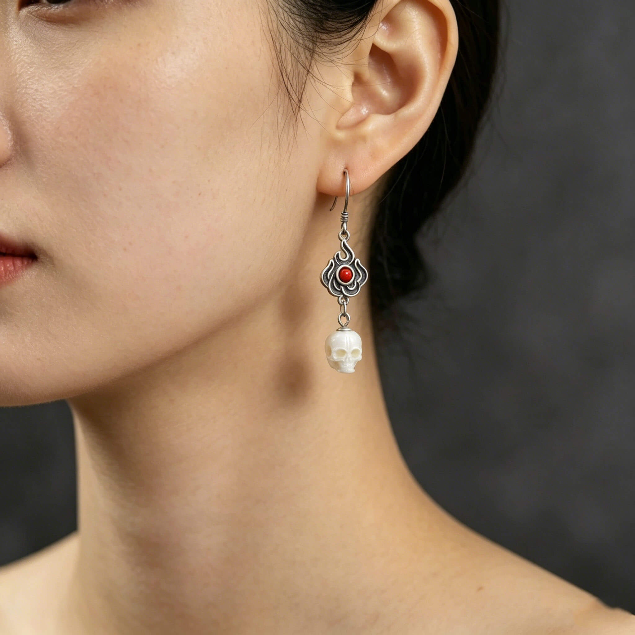 Pendientes de cráneo de perlas en forma de llama