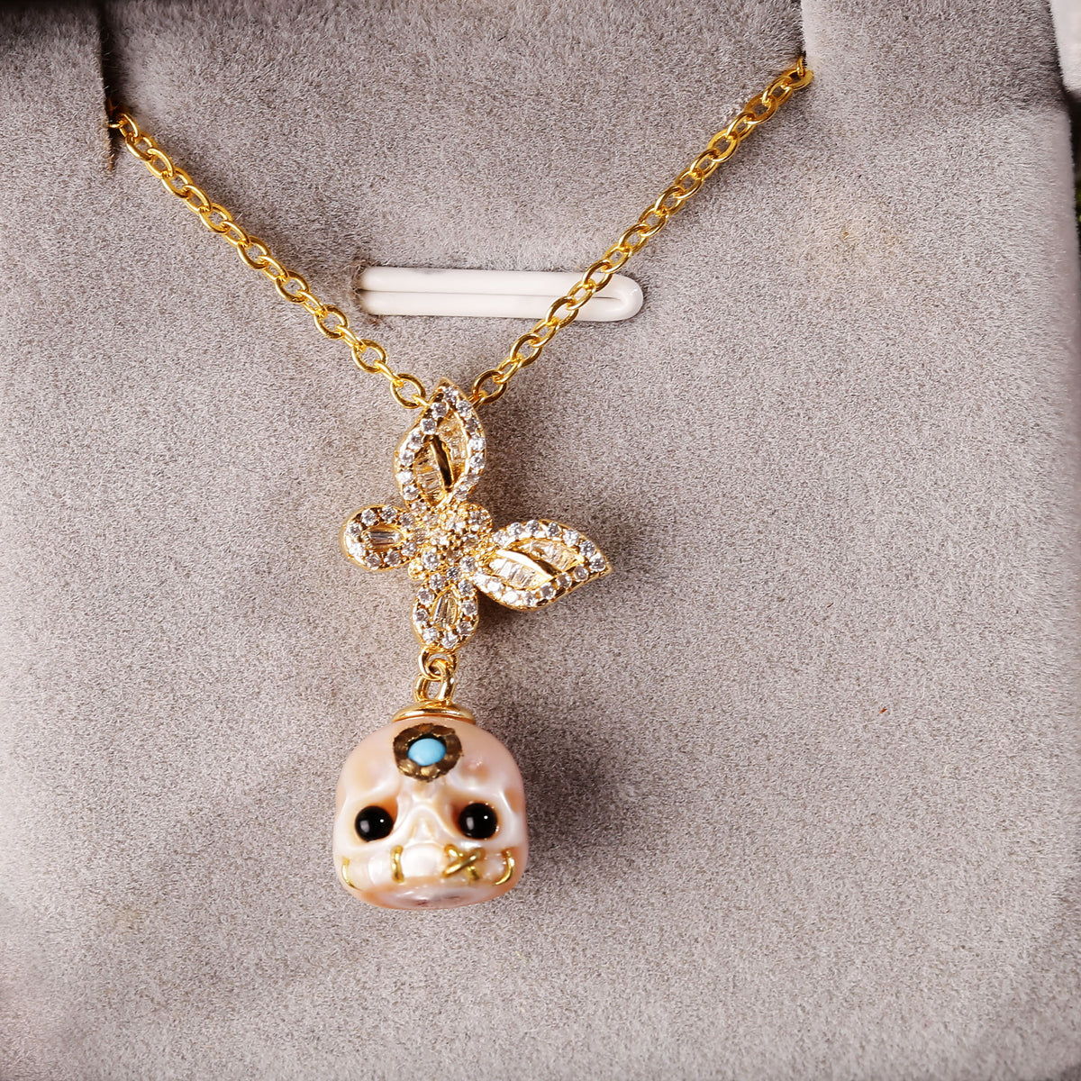 Flying Zircon Butterfly Śmaśana Carved Pearl Skull Necklace