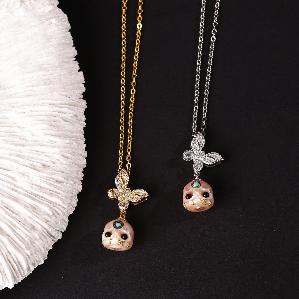 Flying Zircon Butterfly Śmaśana Carved Pearl Skull Necklace