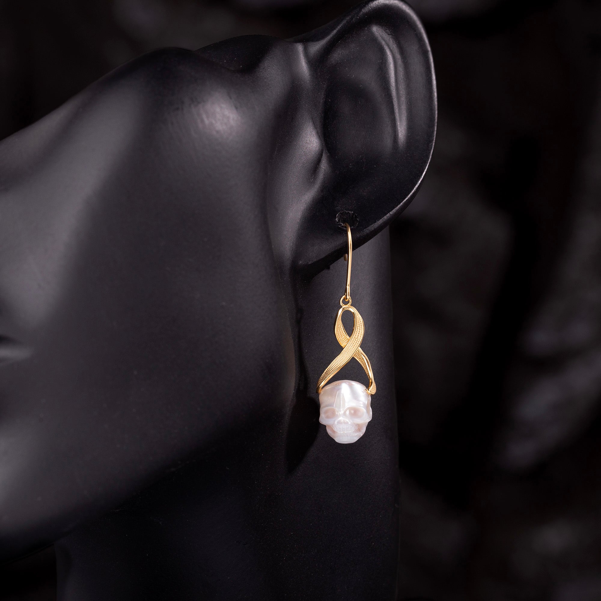 Interlaced Ribbon Pearl Skull Earrings