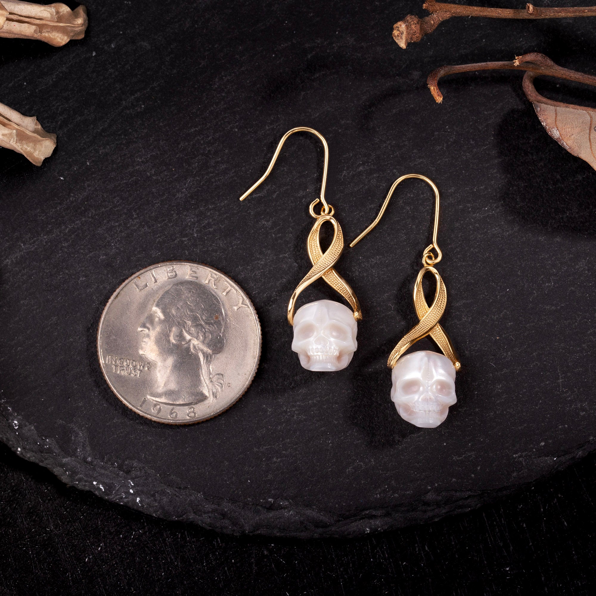 Interlaced Ribbon Pearl Skull Earrings