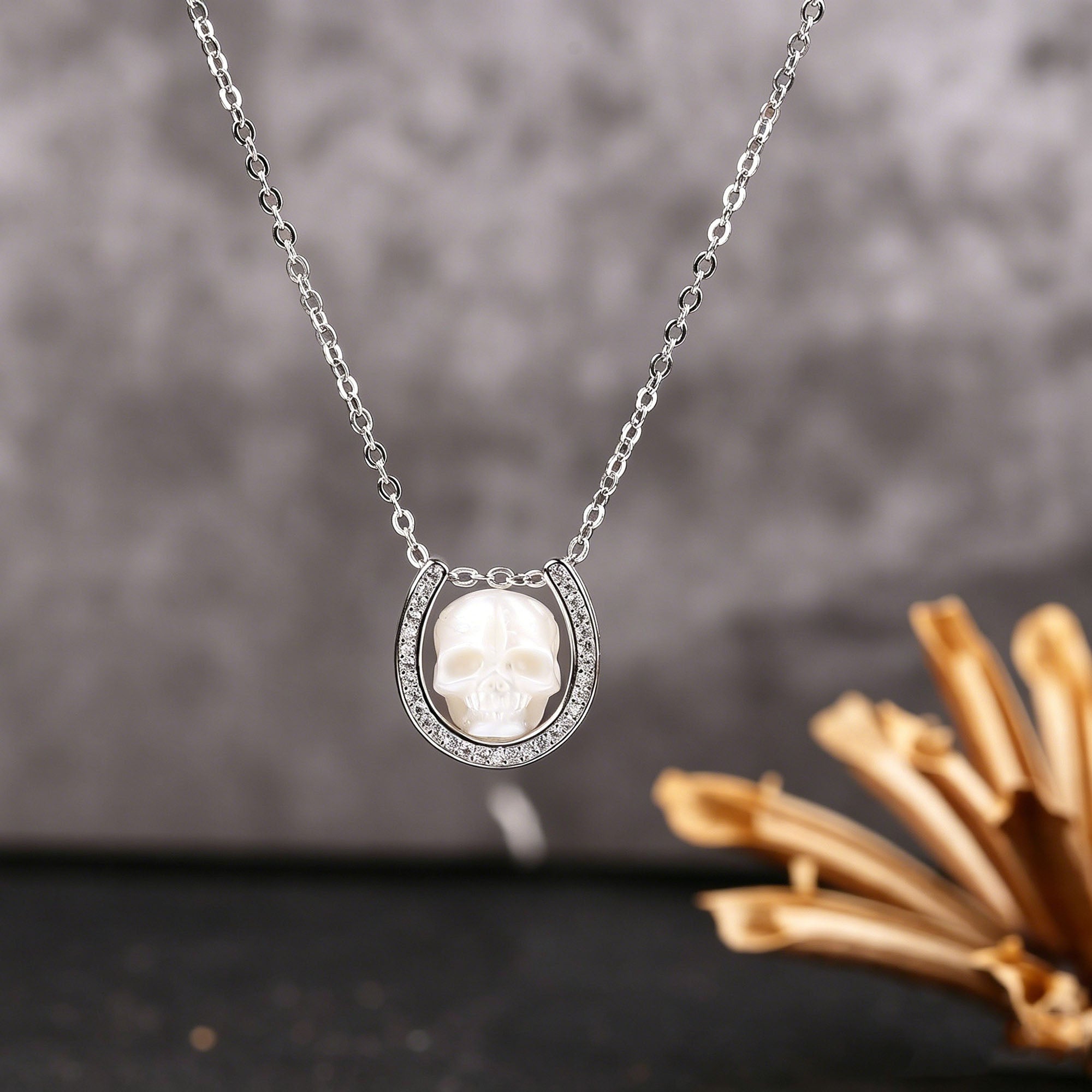 Minimalist Carved Pearl Skull with U‑Shaped Frame Necklace