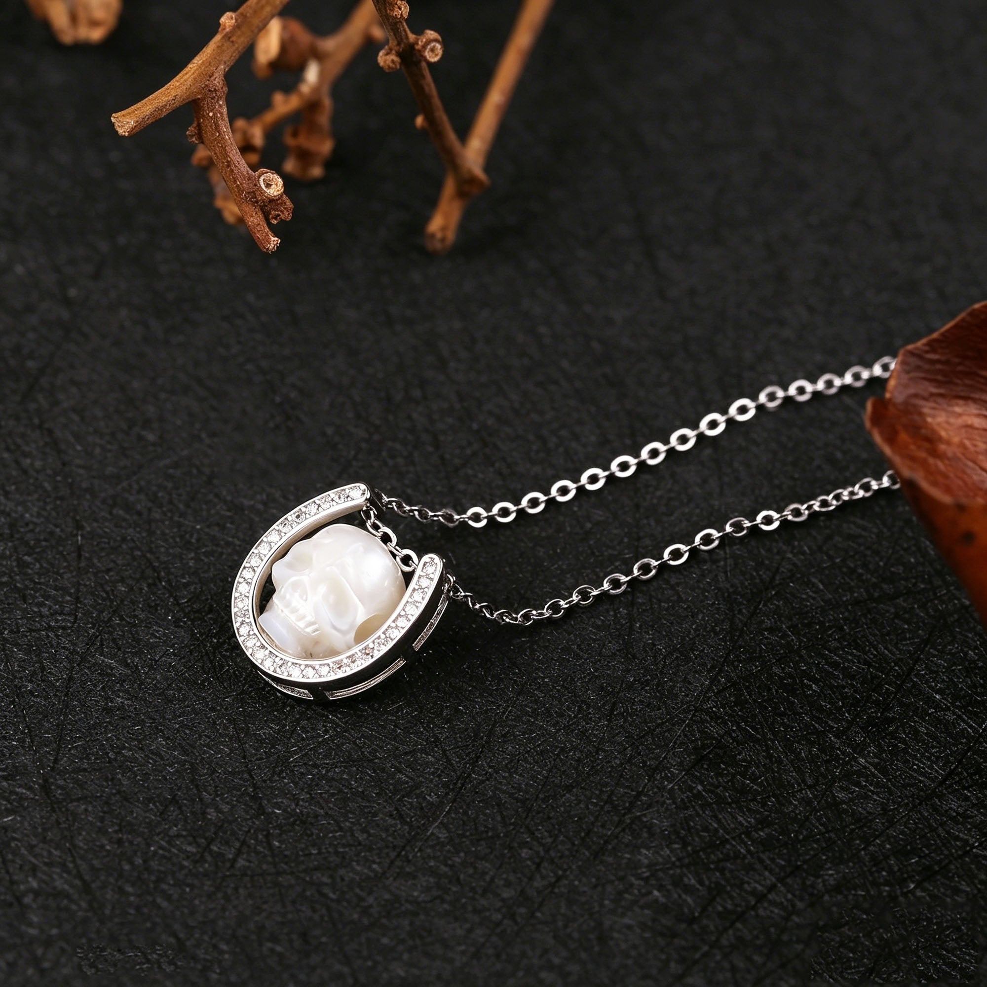 Minimalist Carved Pearl Skull with U‑Shaped Frame Necklace