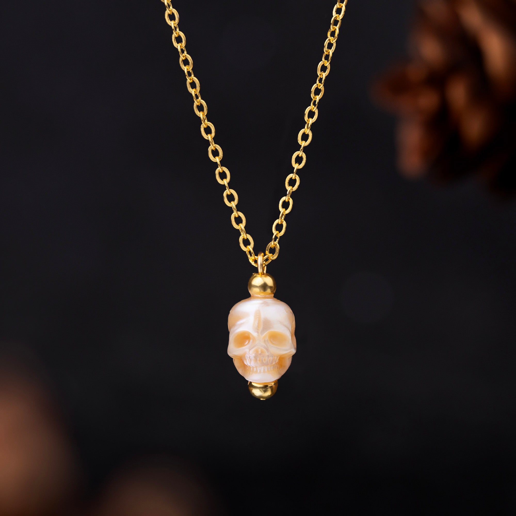 Minimalist Pearl Skull Necklace with Elegant Golden Beads