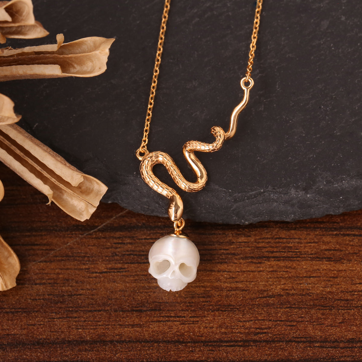 Mystic Snake Carved Pearl Cranium Necklace