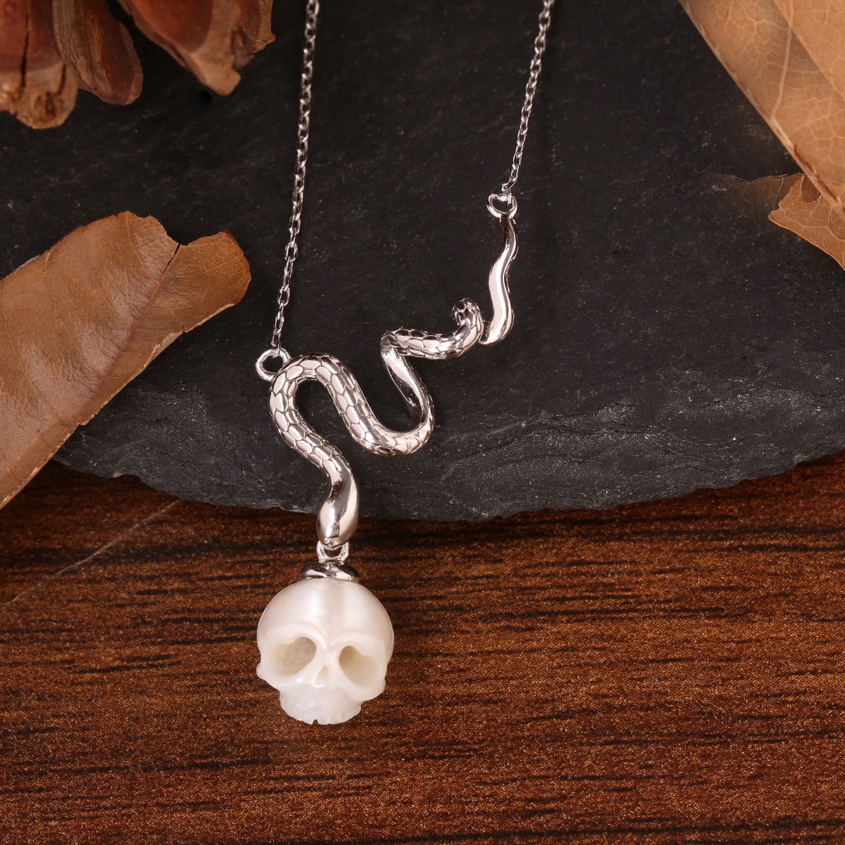 Mystic Snake Carved Pearl Cranium Necklace