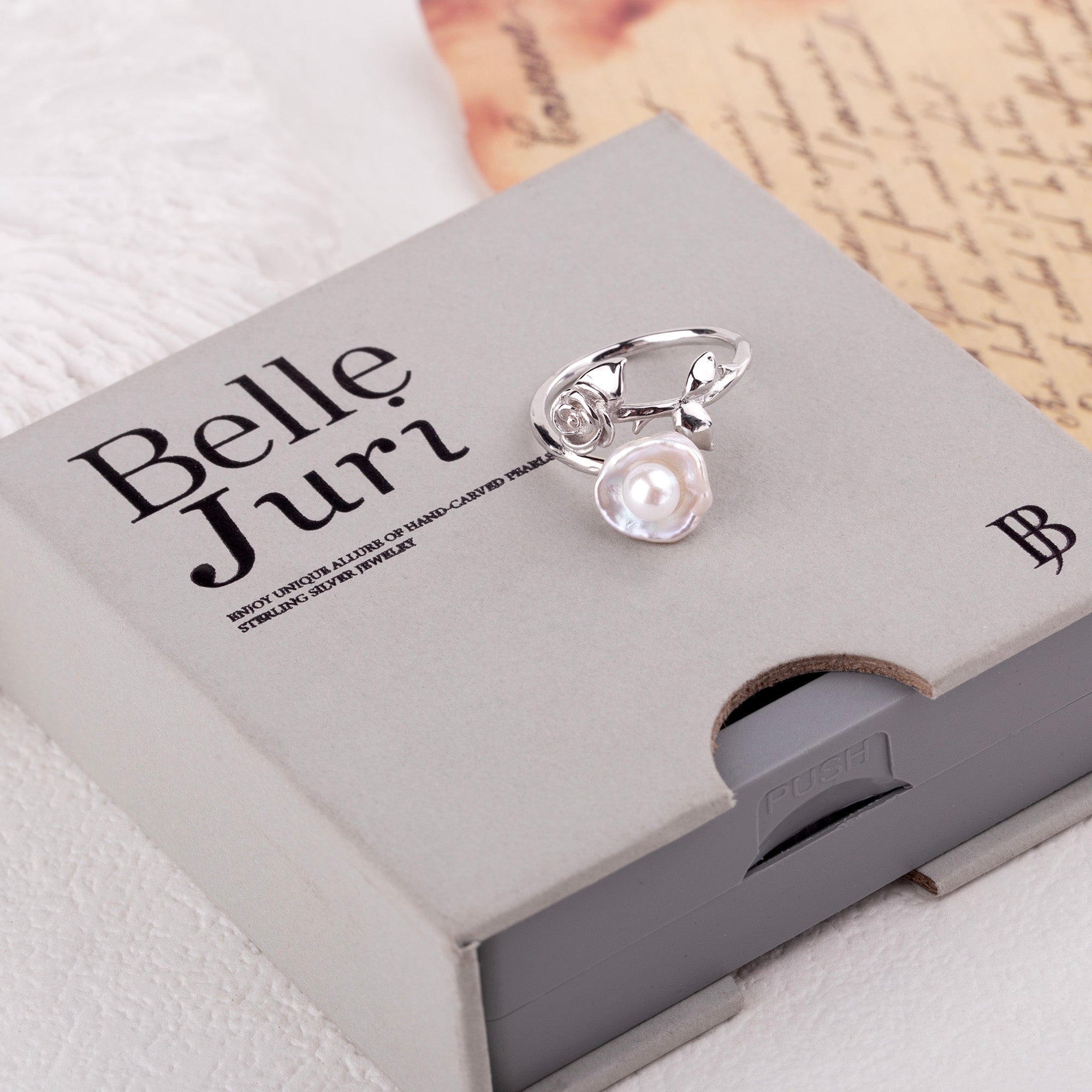 Anello di perle barocco del fiore rosa