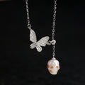 Collar de la cadena de Y de calavera de perlas de mariposa