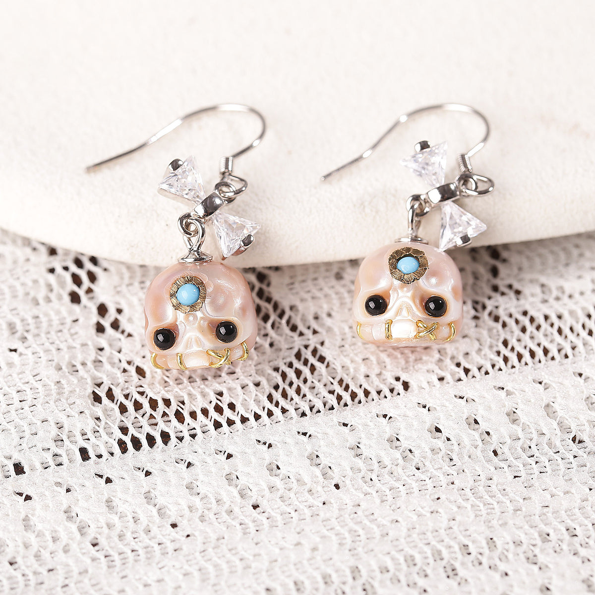 CZ Bow Carved Pearl Skull Śmaśana Fish Hook Earrings