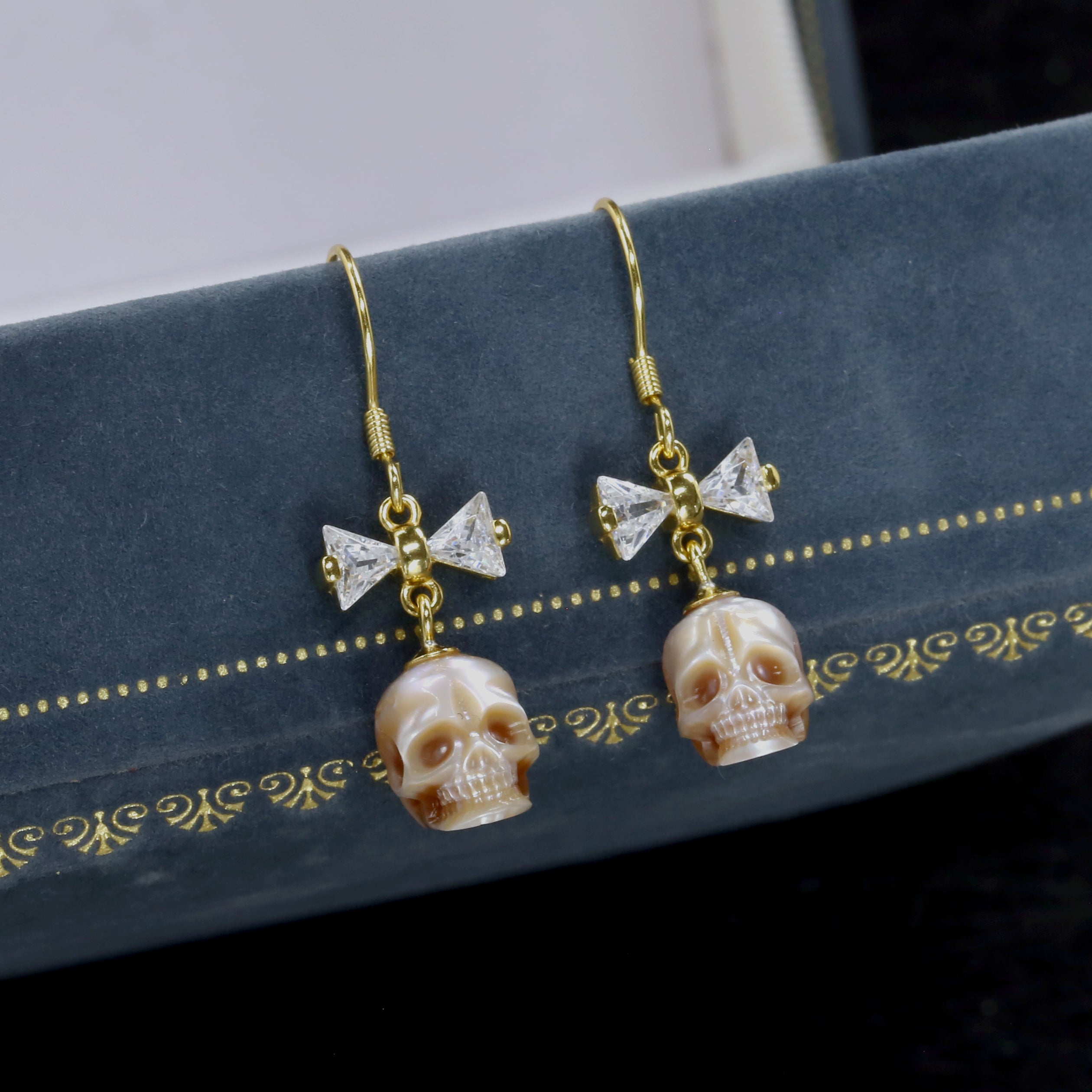 CZ Bow Pearl Skull Hook Earrings