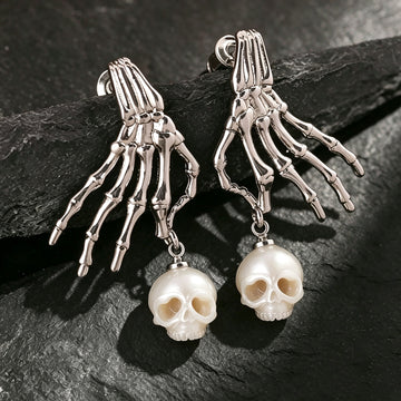 Boucles d'oreilles en peigne de perle de squelette punk