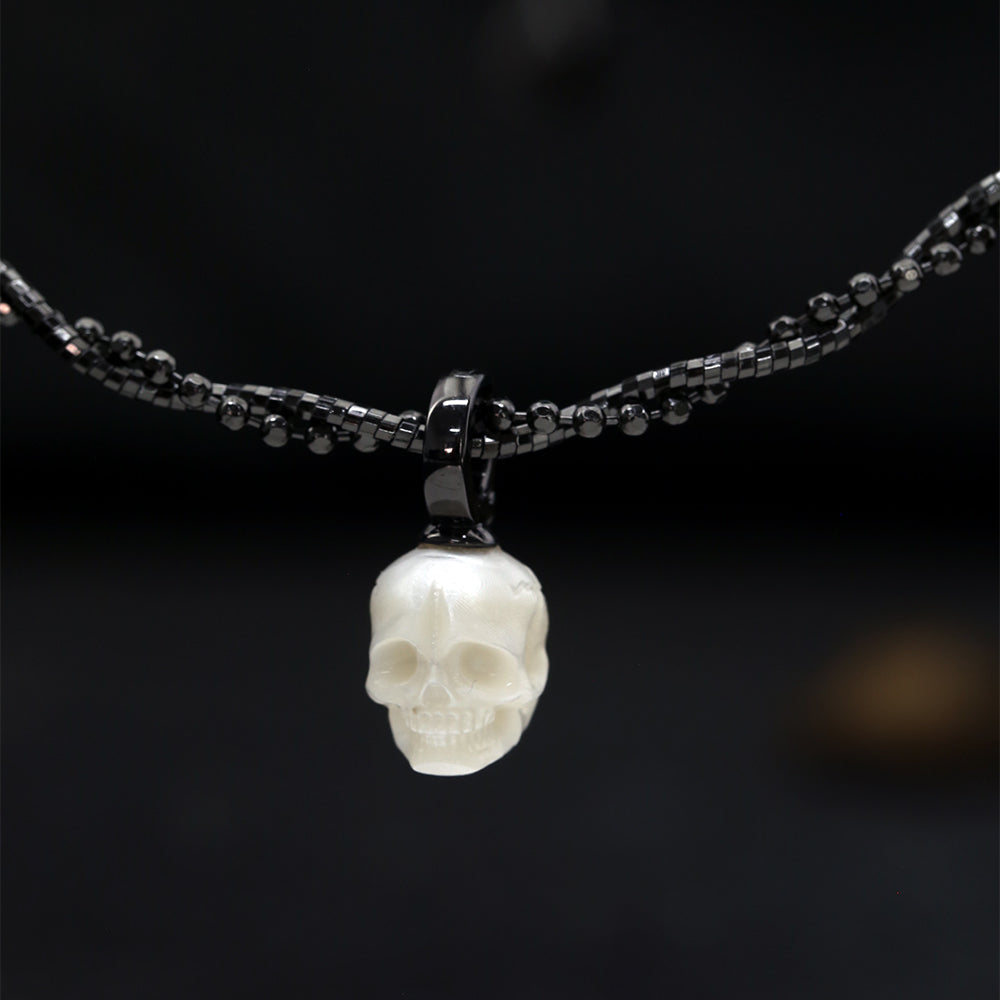 Double-Twist Braided Pearl Skull Necklace