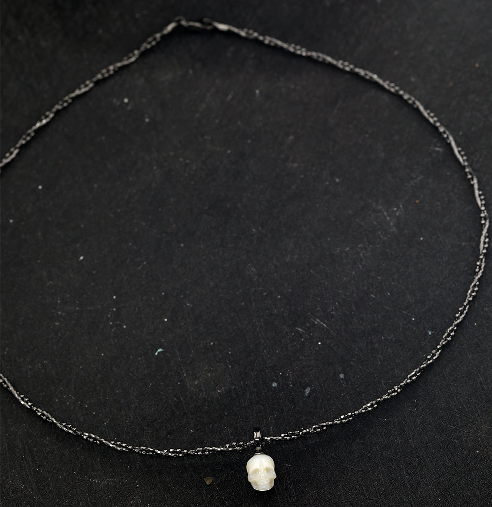 Double-Twist Braided Pearl Skull Necklace