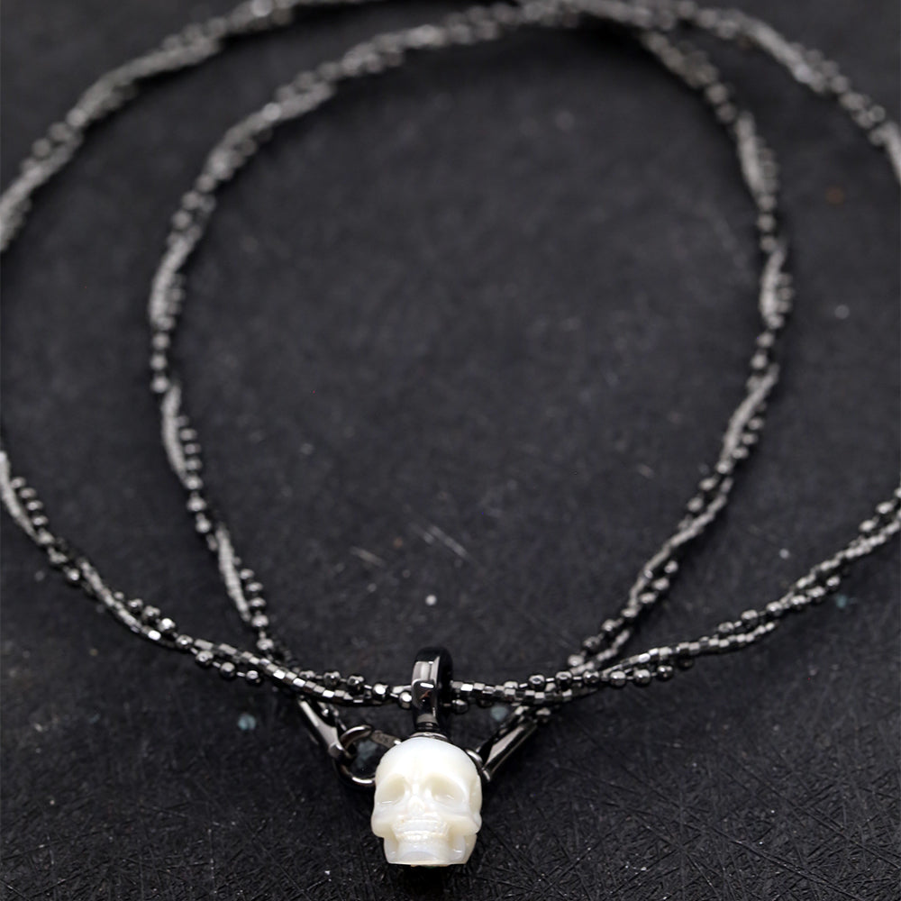 Double-Twist Braided Pearl Skull Necklace