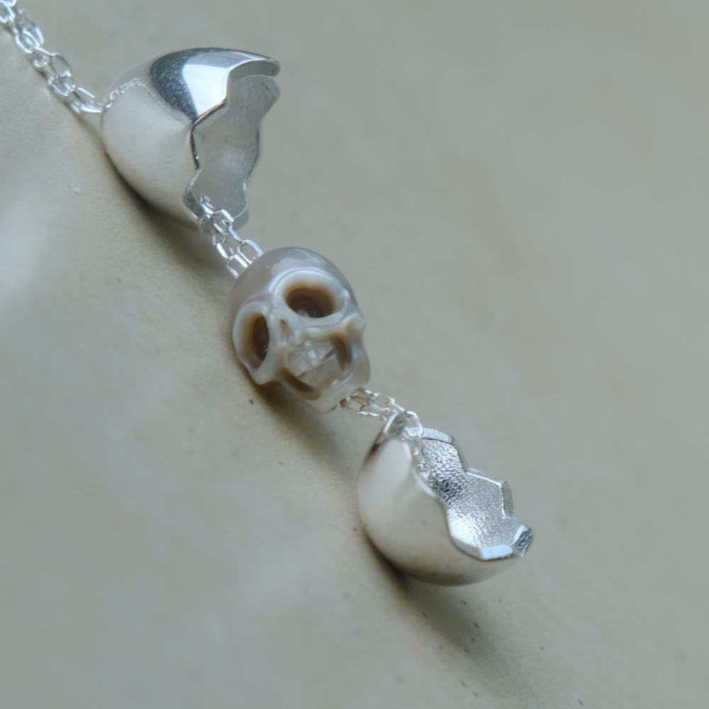 Eggshell Broken Pearl Skull Silver Pendant Necklace