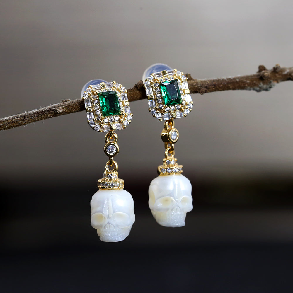 Emerald CZ Halo Pearl Skull Dangle Earrings