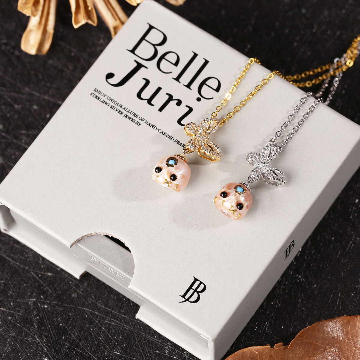 Flying Zircon Butterfly Śmaśana Carved Pearl Skull Necklace