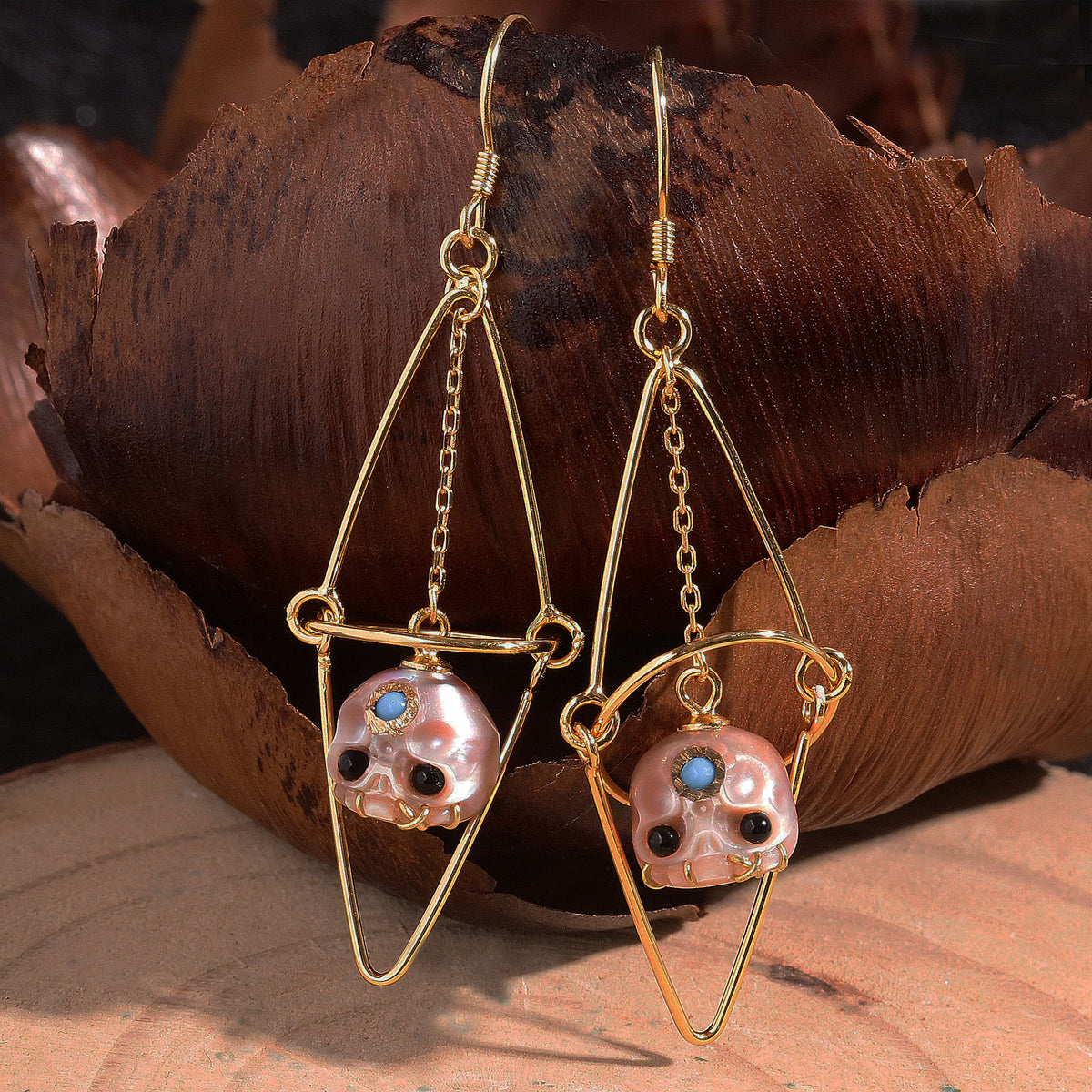 Boucles d'oreilles en cage de crâne perlé géométrique