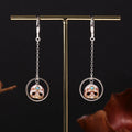 Orecchini classici di cerchio Huggie Drop cranio