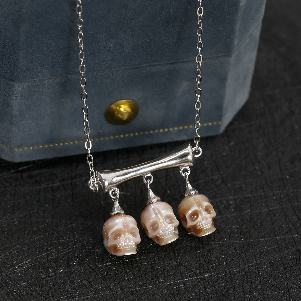 Gothic Three Stone Pearl Skulls Necklace