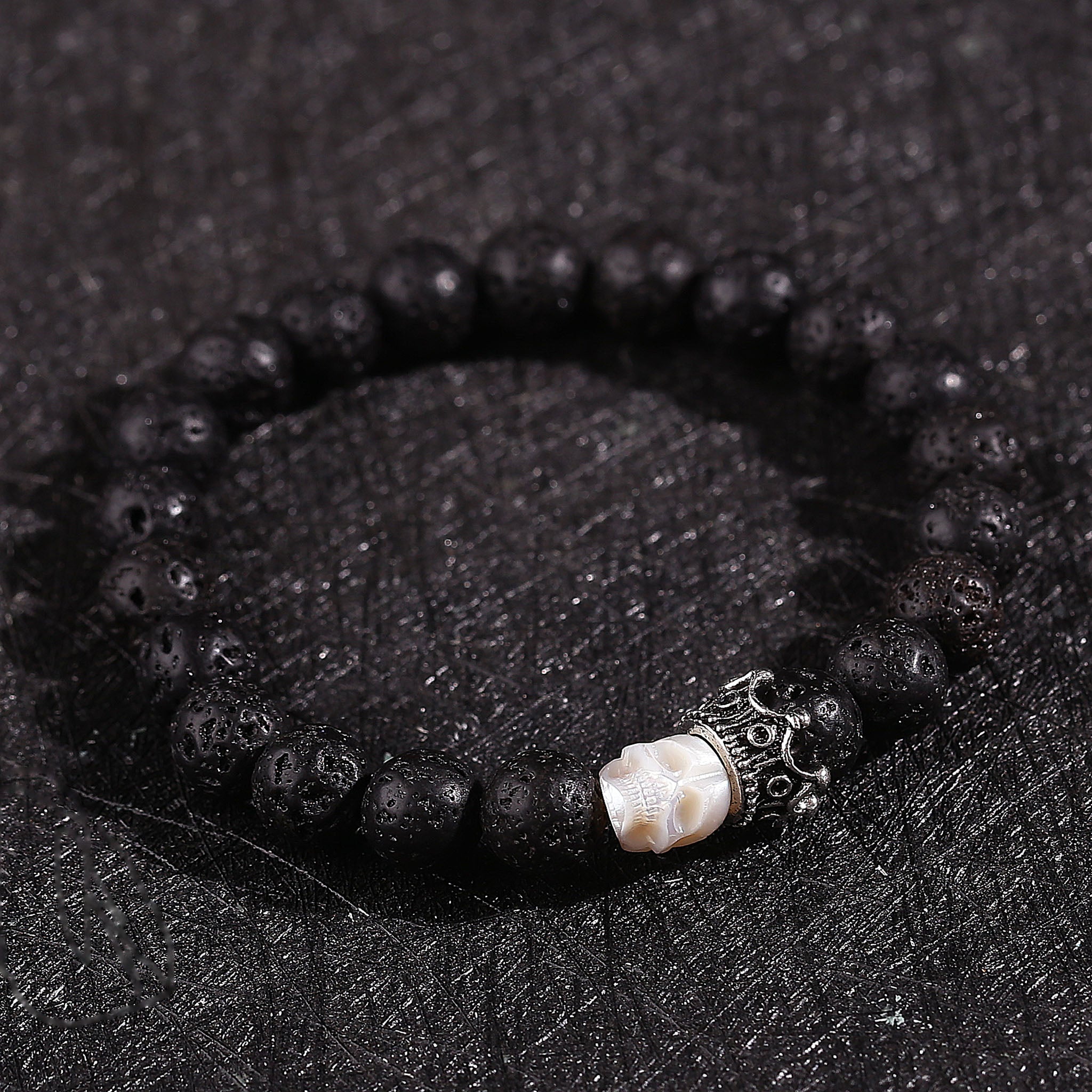 Hand Carved Skull Lava Stone Bracelet