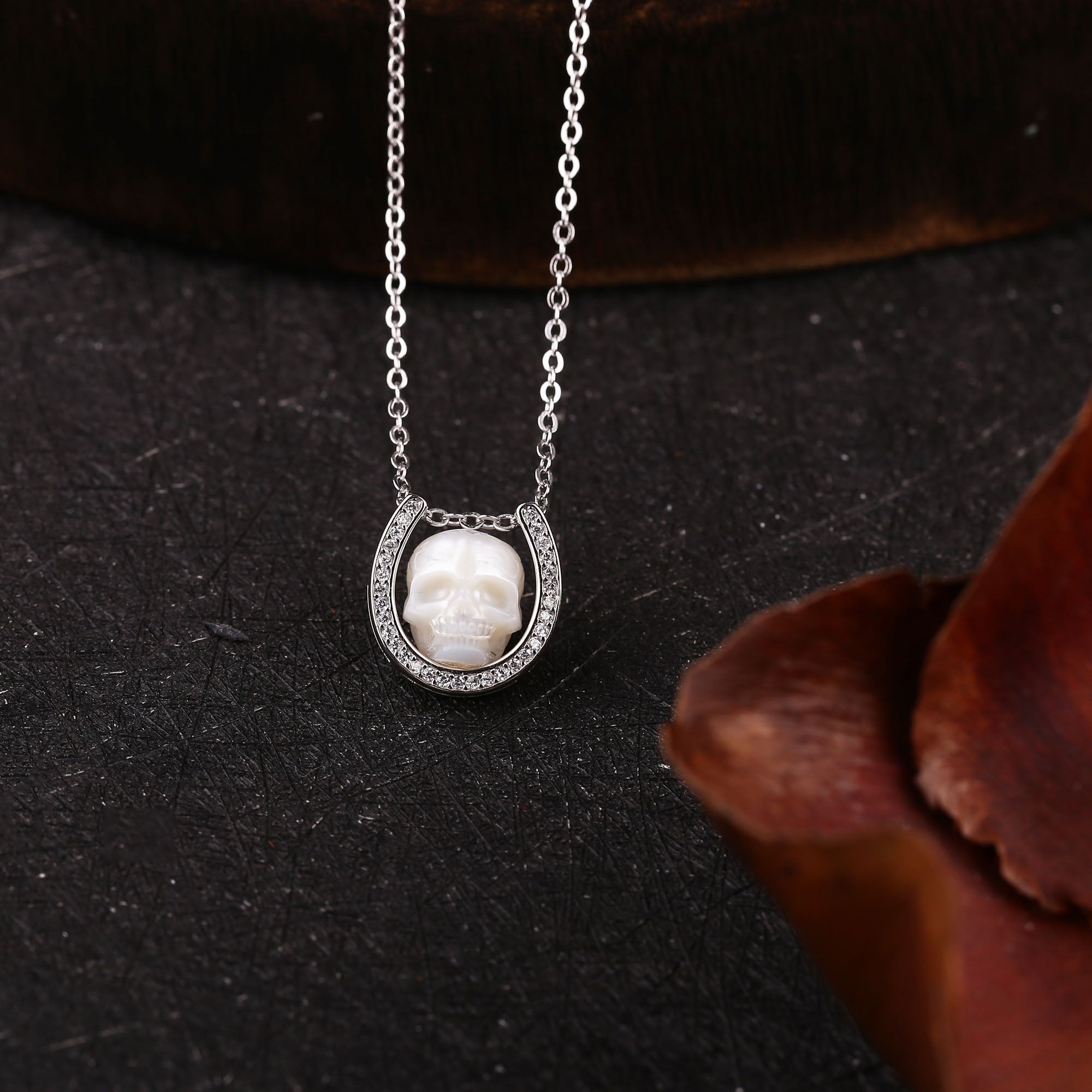 Minimalist Carved Pearl Skull with U‑Shaped Frame Necklace