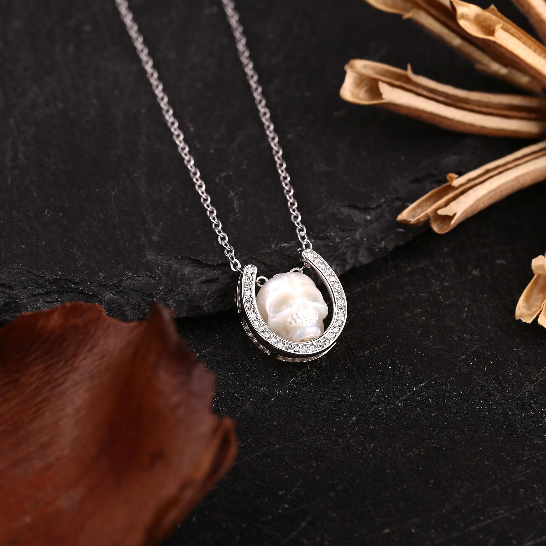 Minimalist Carved Pearl Skull with U‑Shaped Frame Necklace