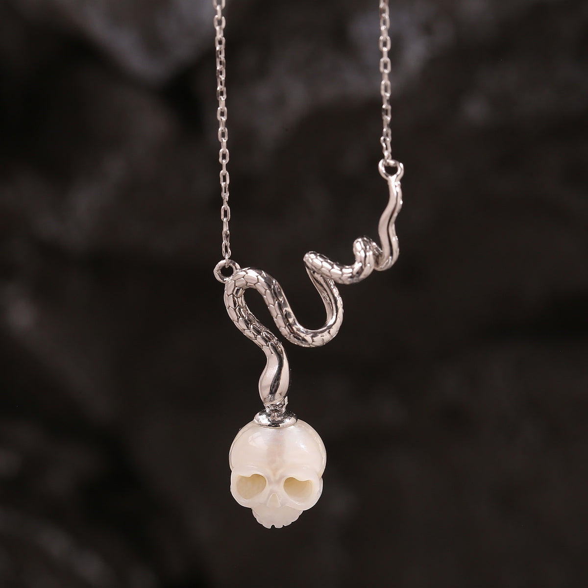 Mystic Snake Carved Pearl Cranium Necklace