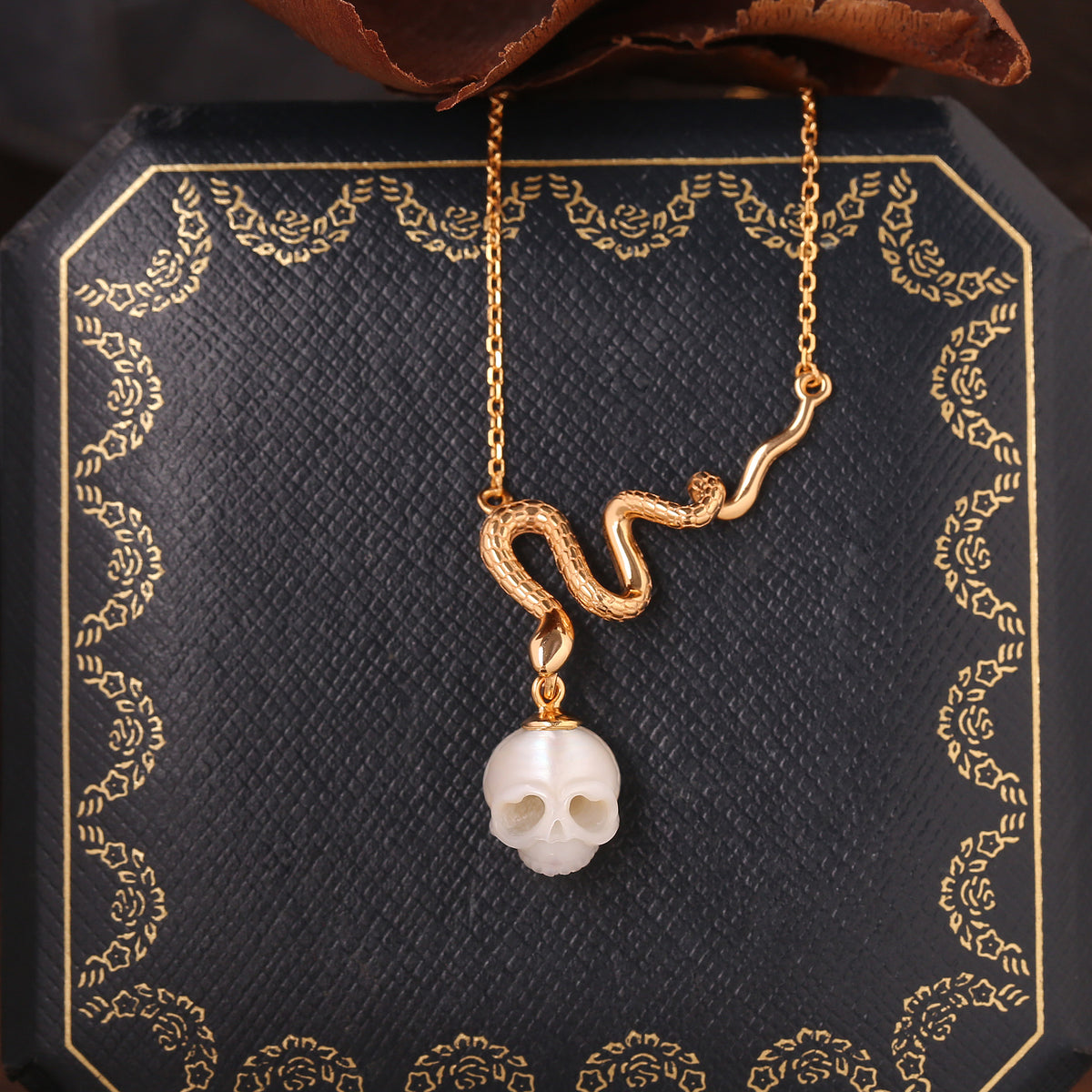 Mystic Snake Carved Pearl Cranium Necklace