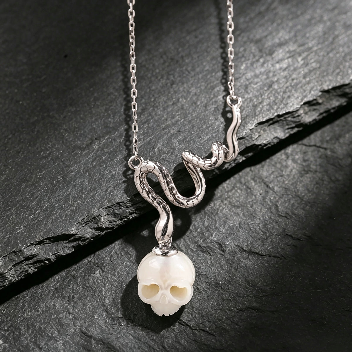 Mystic Snake Carved Pearl Cranium Necklace