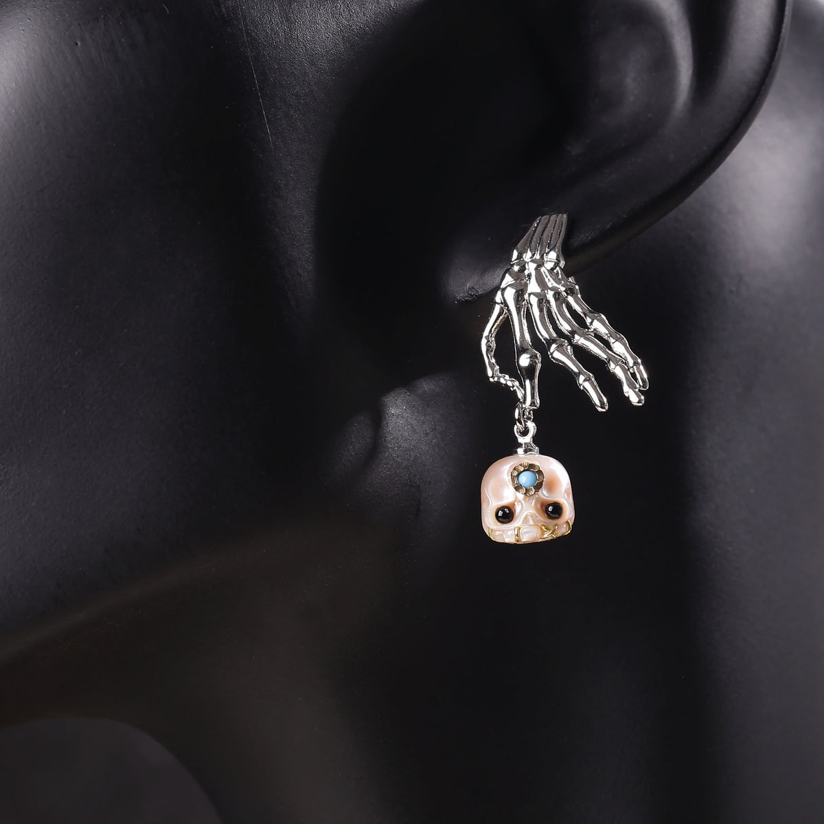 Boucles d'oreilles en peigne de perle de squelette punk