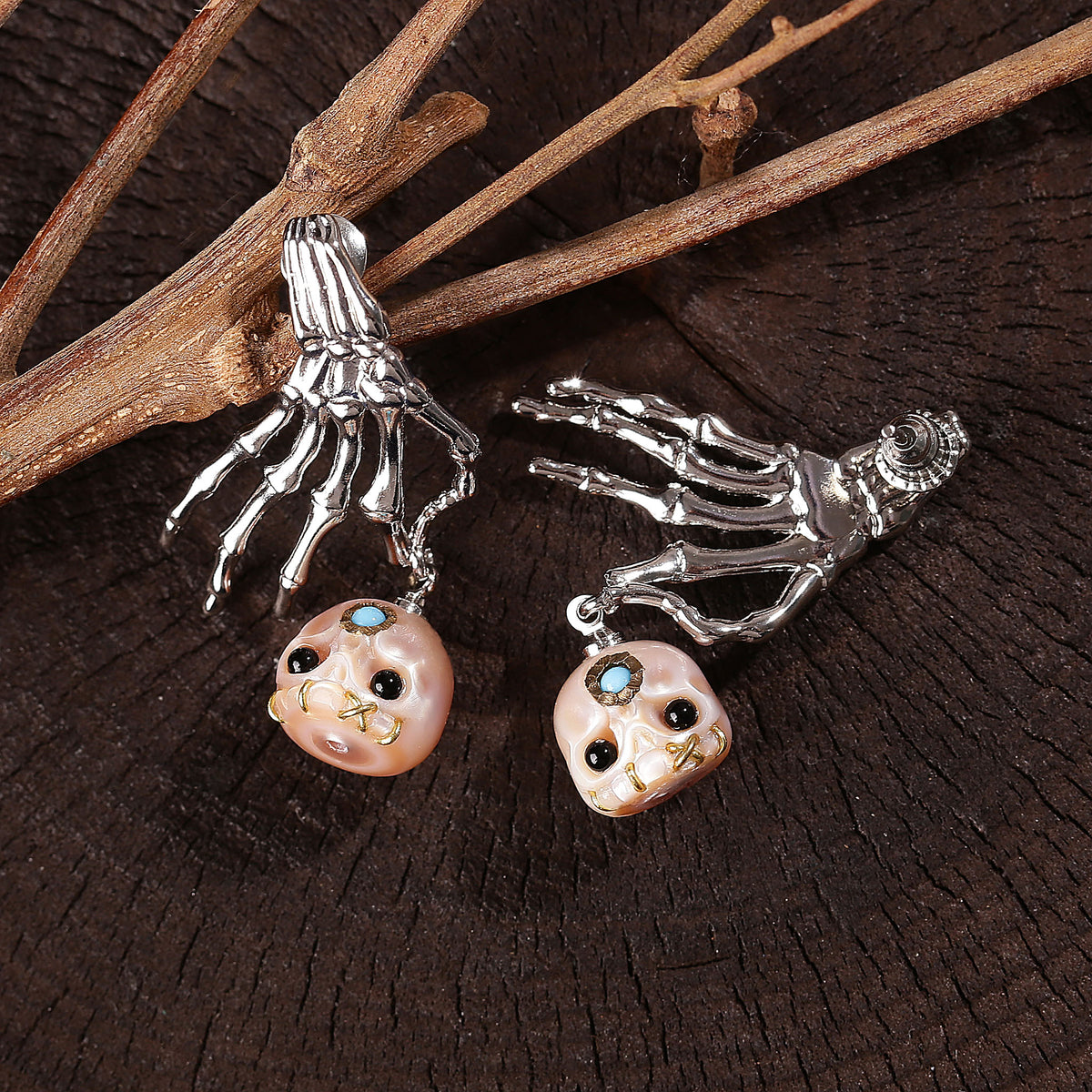 Boucles d'oreilles en peigne de perle de squelette punk
