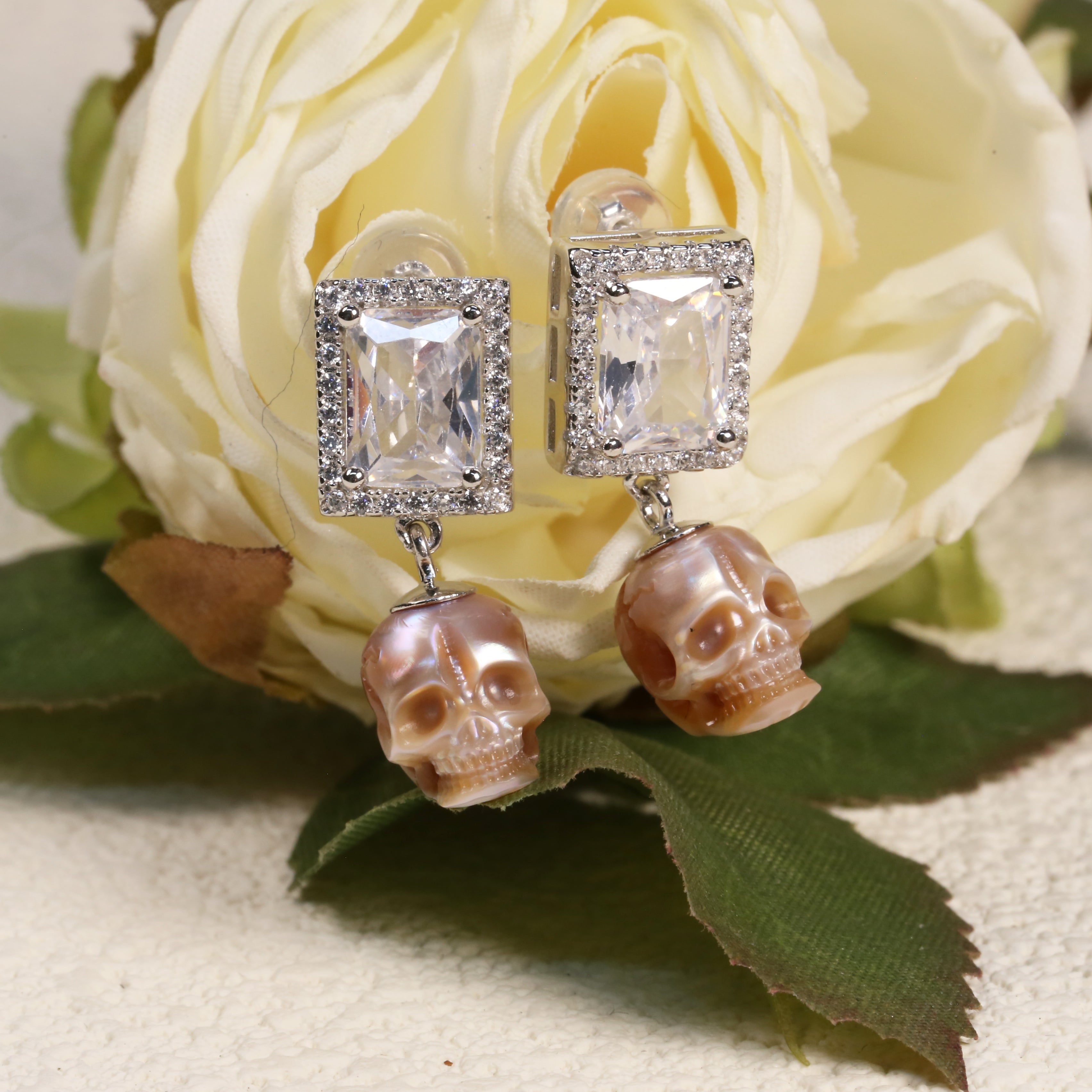 Radiant CZ Halo Pearl Skull Earrings